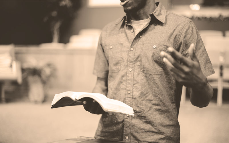 pastor preaching bible