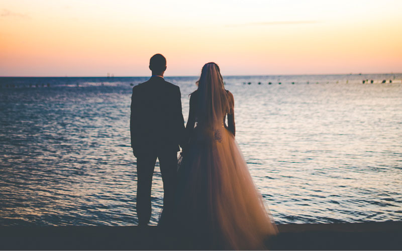 Married couple on the beach