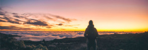Standing and looking at the sunset