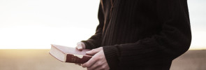 Holding a Bible