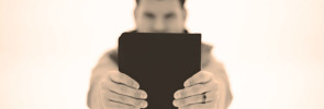 Man Holding Bible