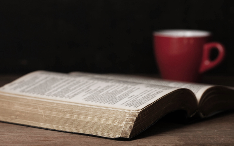 Open Bible with Coffee Cup
