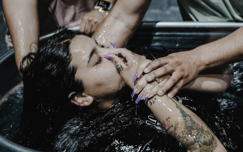 Woman being baptized