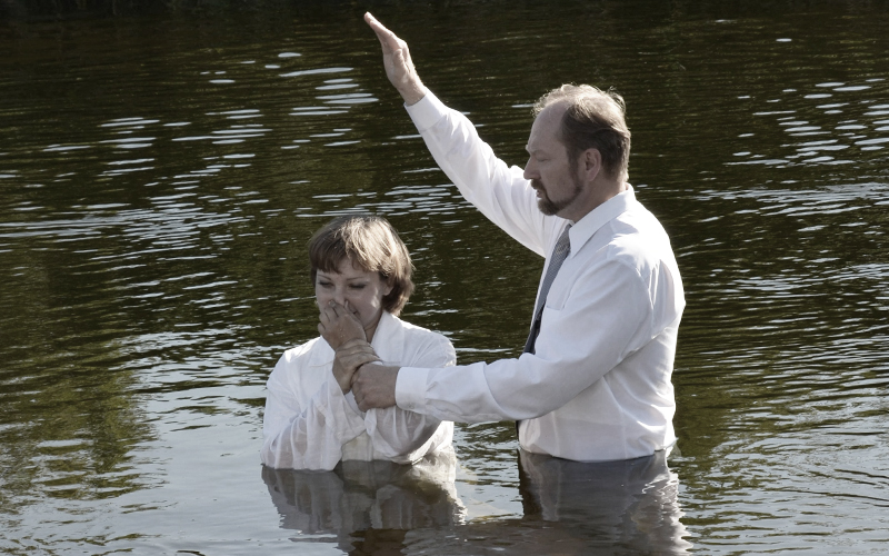 Woman Being Baptized