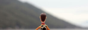 Woody Toy Story doll by lake